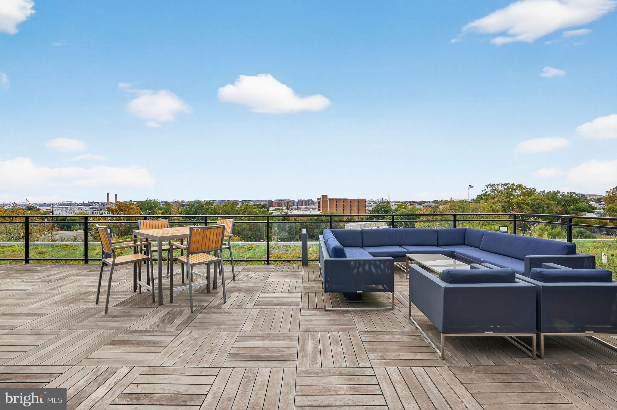 900 11th Street Southeast, Unit 308 Washington, DC 20003 - Photo 25 of 36 a view of a terrace with furniture