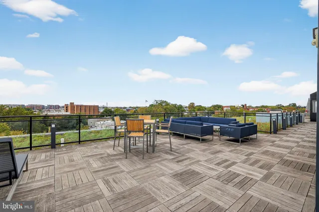 a view of a terrace with furniture
