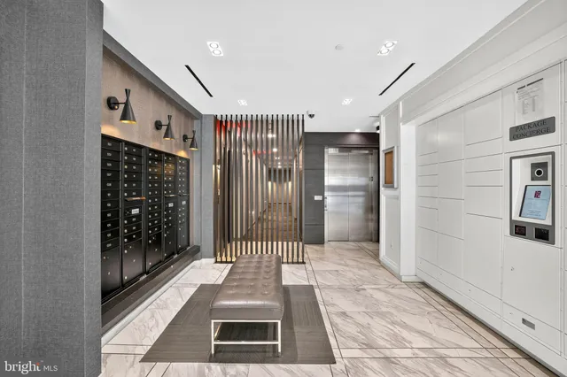 a bathroom with glass door shower and sink