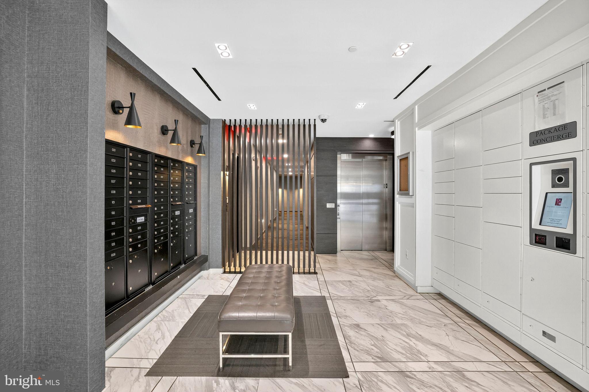 900 11th Street Southeast, Unit 308 Washington, DC 20003 - Photo 29 of 36 a bathroom with glass door shower and sink