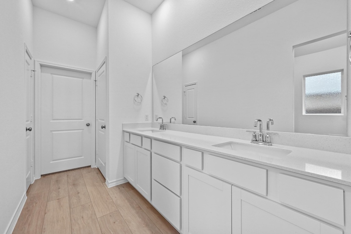 1617 Dove Rnch Road Georgetown, TX 78628 - Photo 13 of 25 a bathroom with a sink and a mirror