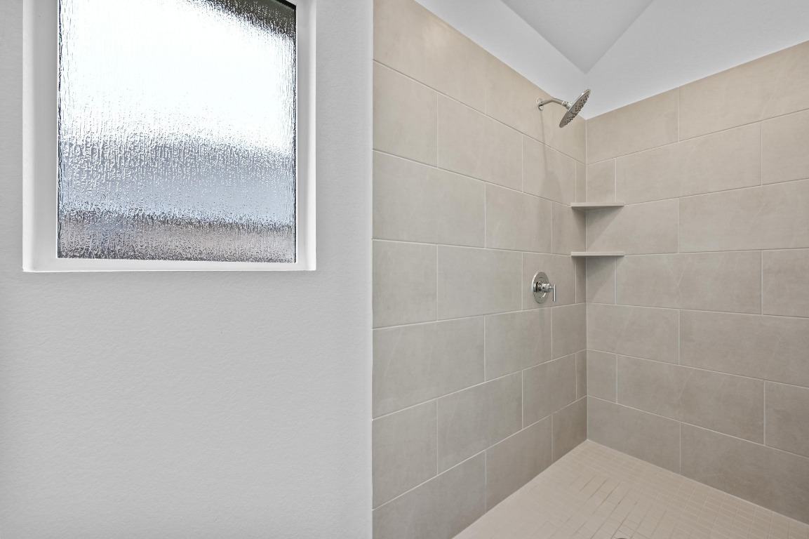 1617 Dove Rnch Road Georgetown, TX 78628 - Photo 14 of 25 a bathroom with a shower