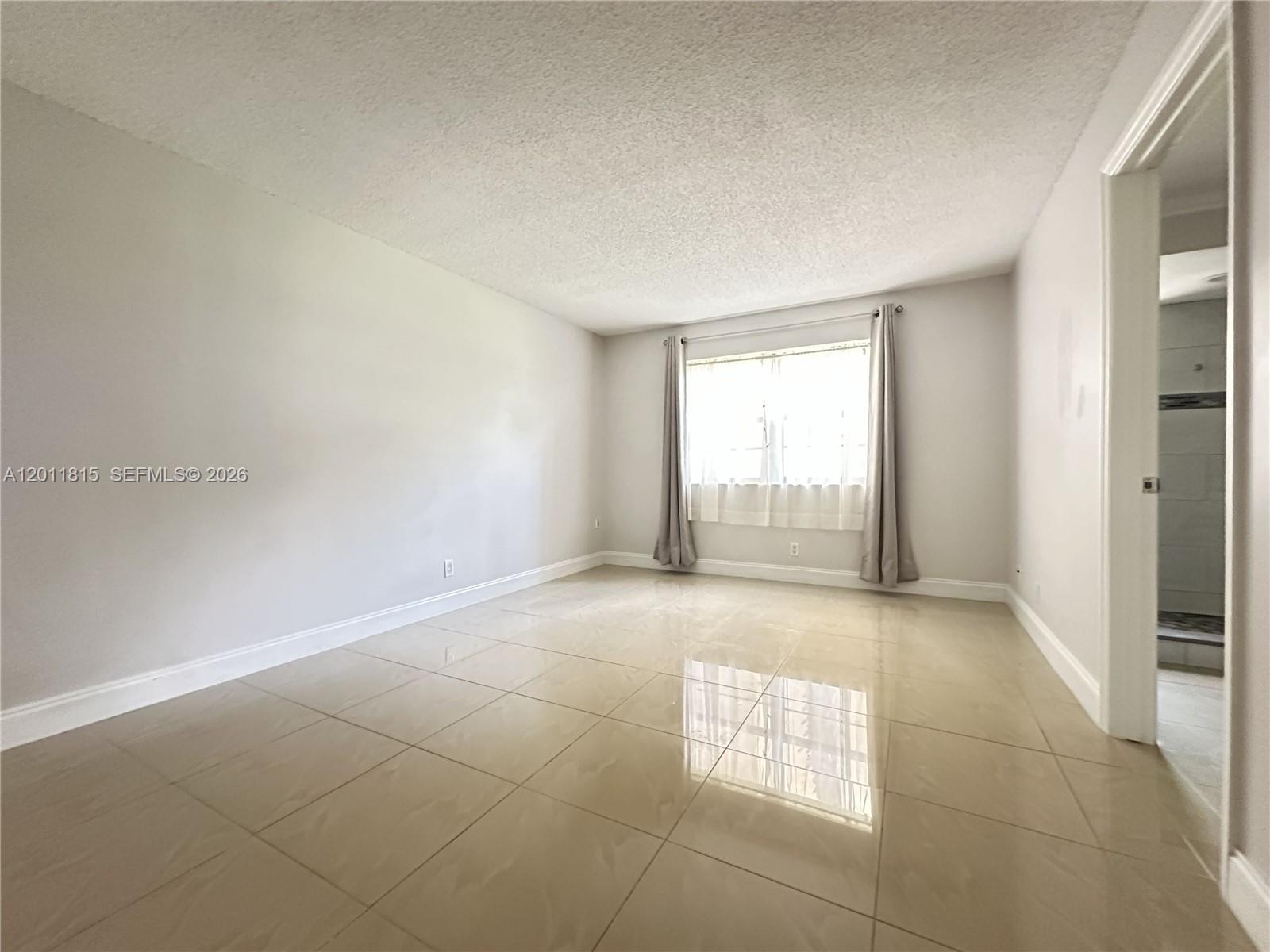 9370 Southwest 8th Street, Unit 107 Boca Raton, FL 33428 - Photo 3 of 17 Primary Bedroom