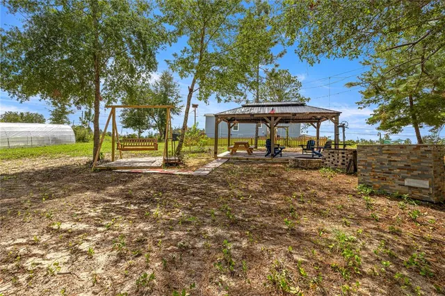 a view of a garden with an outdoor space