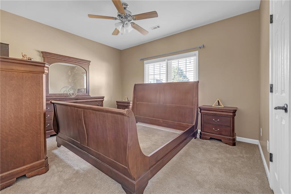604 Arbor Ridge Loganville, GA 30052 - Photo 16 of 39 a view of room with window and furniture