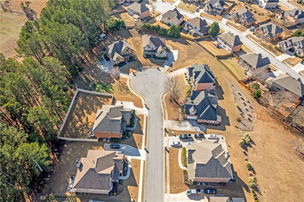 604 Arbor Ridge Loganville, GA 30052 - Photo 36 of 39 an aerial view of residential houses with outdoor space