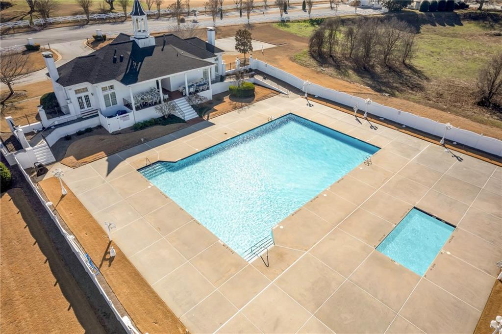 604 Arbor Ridge Loganville, GA 30052 - Photo 38 of 39 a view of a swimming pool with outdoor seating