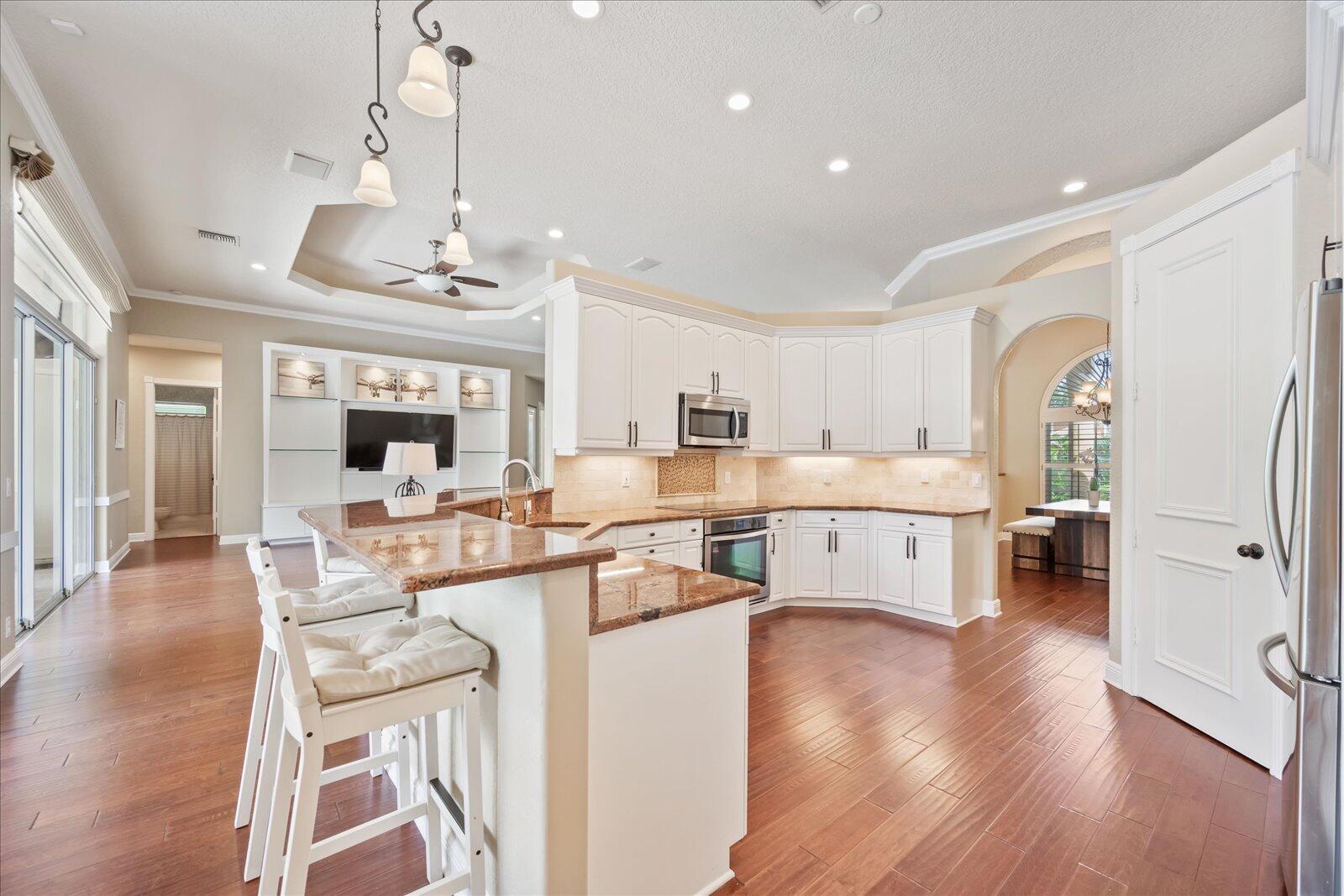 15400 Emmelman Road Wellington, FL 33414 - Photo 11 of 41 Stainless steel appliances and granite