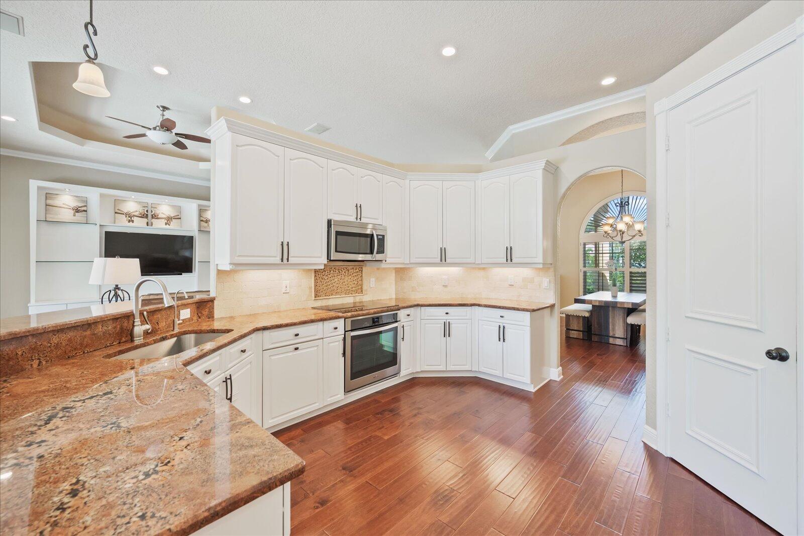 15400 Emmelman Road Wellington, FL 33414 - Photo 12 of 41 Great lighting and walk in pantry