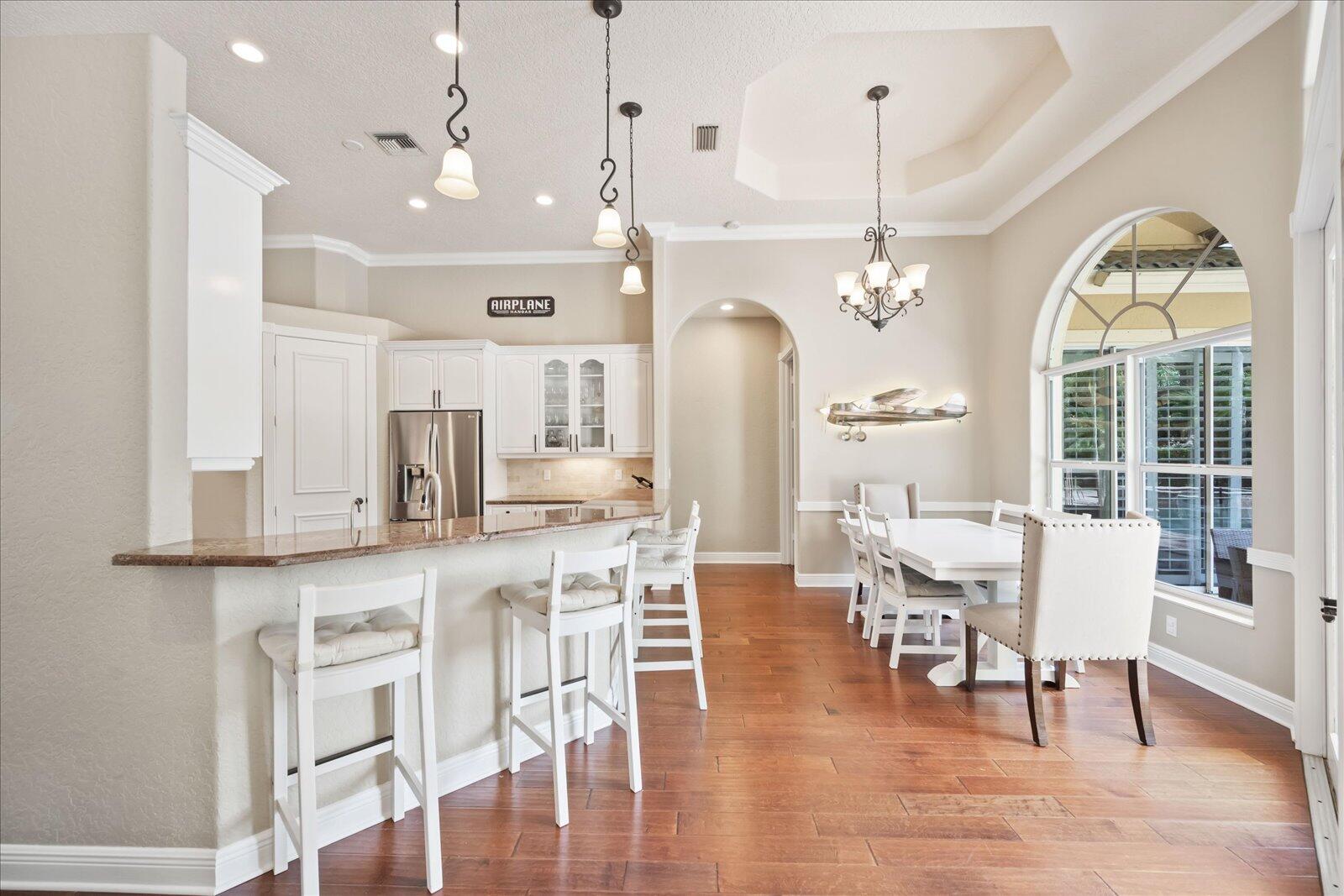 15400 Emmelman Road Wellington, FL 33414 - Photo 13 of 41 Handy dining nook overlooking pool