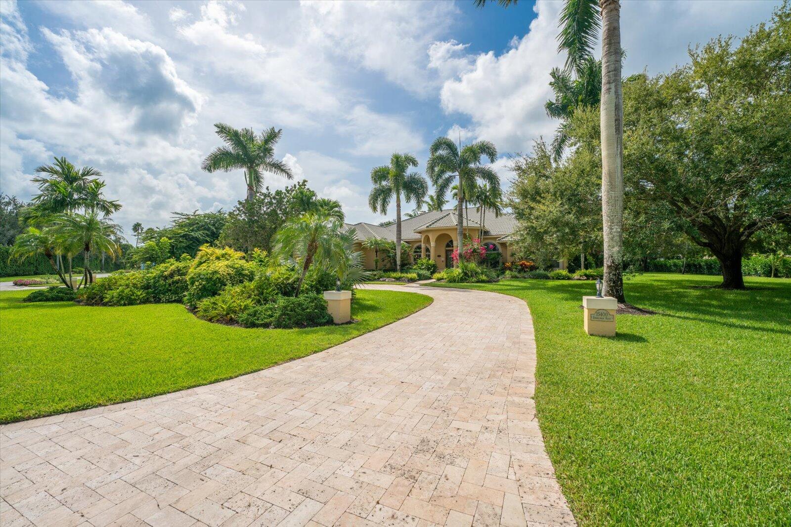 15400 Emmelman Road Wellington, FL 33414 - Photo 2 of 41 All travertine crescent driveway