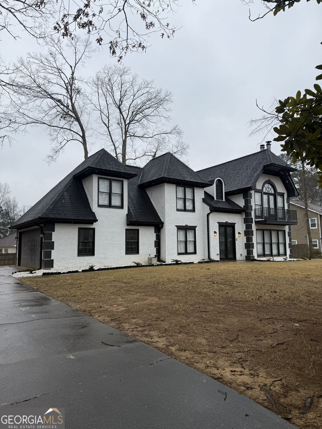 3406 Uncle Genes Way Southeast Conyers, GA 30013 - Photo 2 of 17 front view of house with a street