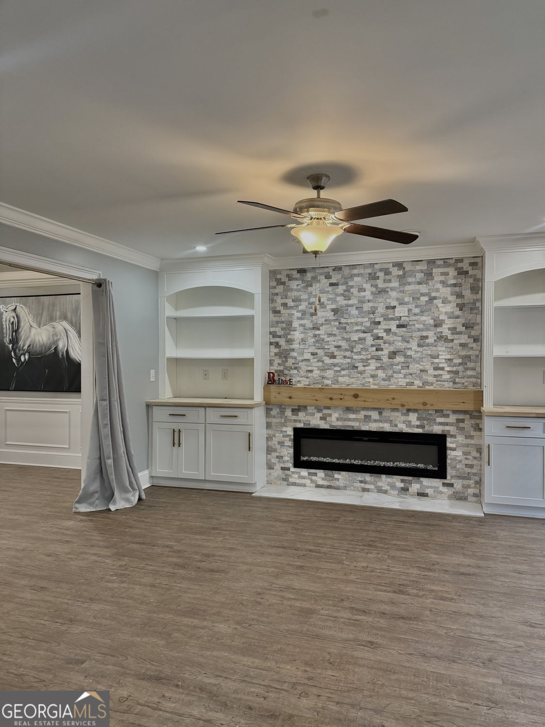 3406 Uncle Genes Way Southeast Conyers, GA 30013 - Photo 8 of 17 a living room with a fireplace