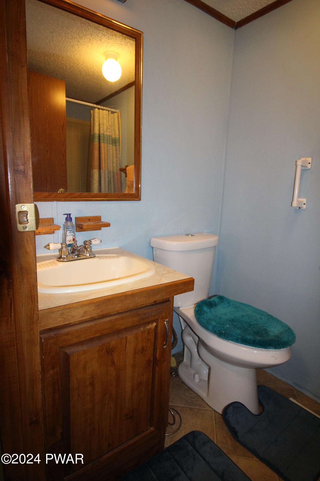 10 Madison Estate Moscow, PA 18444 - Photo 20 of 45 a bathroom with a sink and a mirror