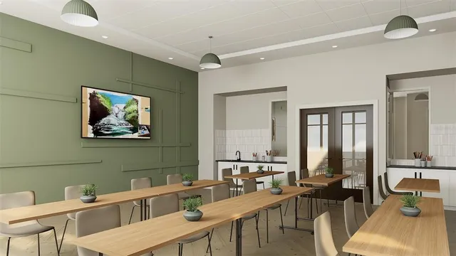 a very nice looking dining room with kitchen island furniture a chandelier and kitchen view