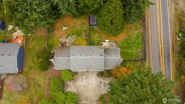 an aerial view of a house with a outdoor space