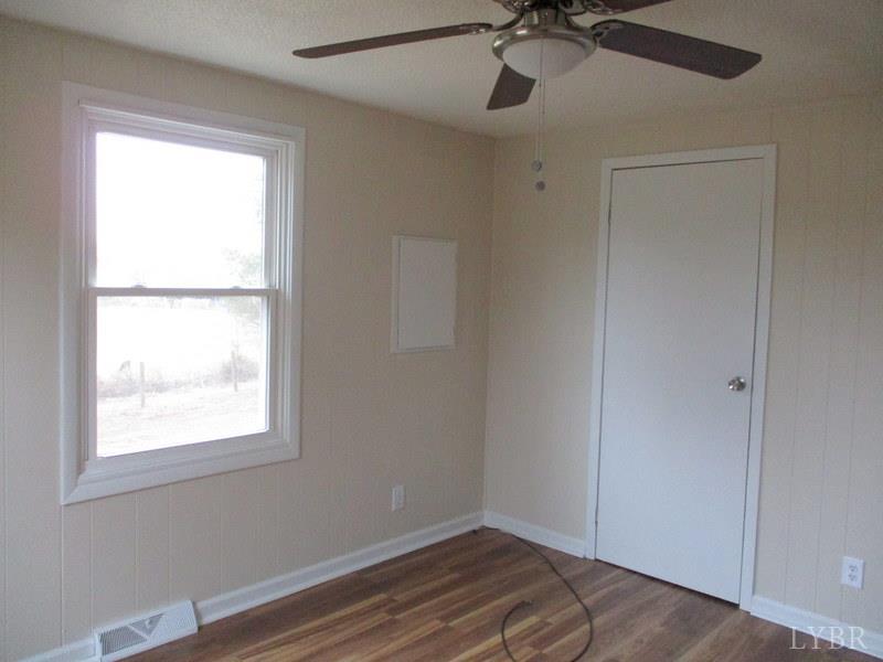 3009 Pocket Road Hurt, VA 24563 - Photo 13 of 25 a view of room with a window and ceiling fan