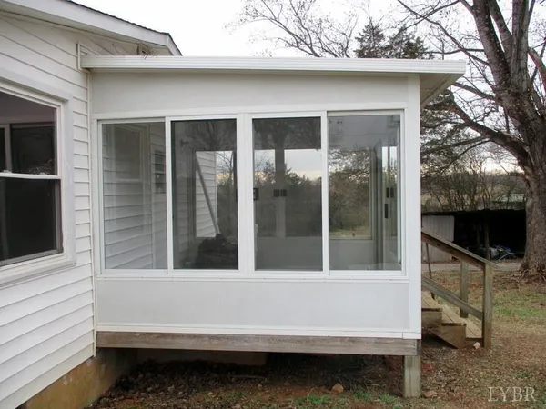 a bathroom with a tub and shower