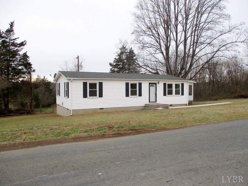 3009 Pocket Road Hurt, VA 24563 - Photo 22 of 25 a view of a house with backyard and trees