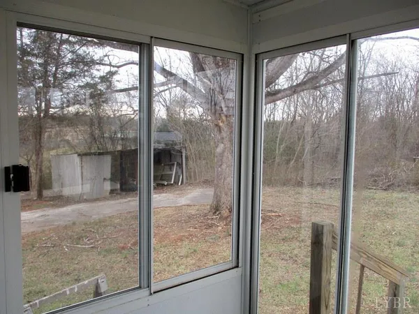 a view of a glass door and the porch