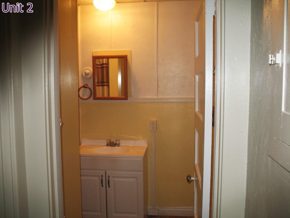484 Teece Avenue Pittsburgh, PA 15202 - Photo 25 of 25 a bathroom with a sink and mirror