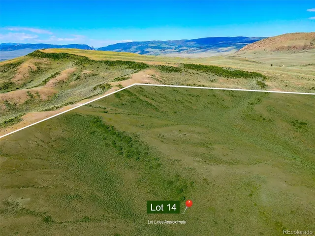 a view of an ocean and a mountain