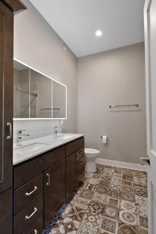 a bathroom with a sink and a toilet