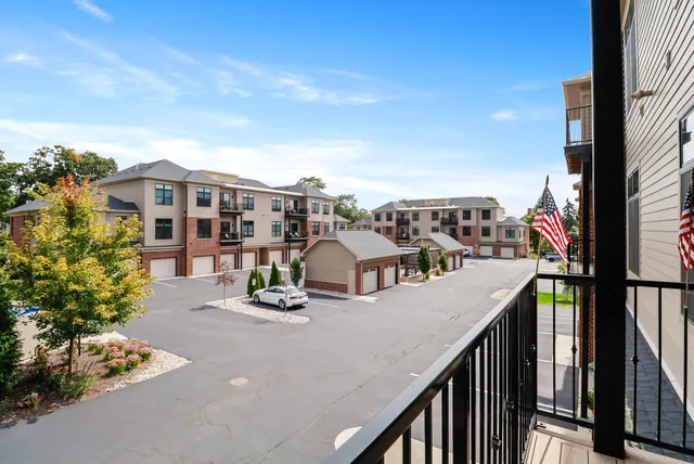 a balcony view with a garden