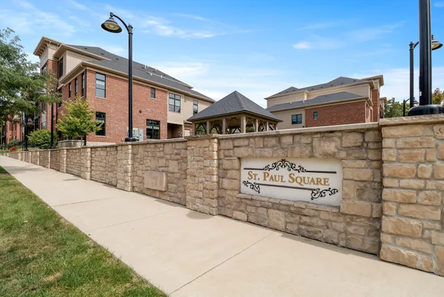 a front view of a building with street view