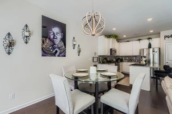 a view of a dining room with furniture