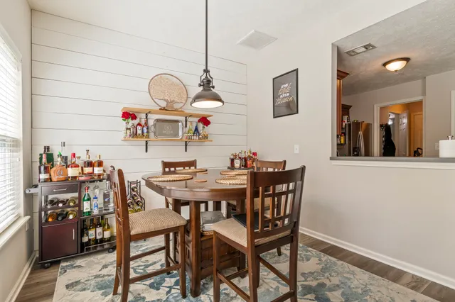 a view of a dining room with furniture