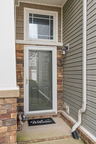 a front view of a house with a door