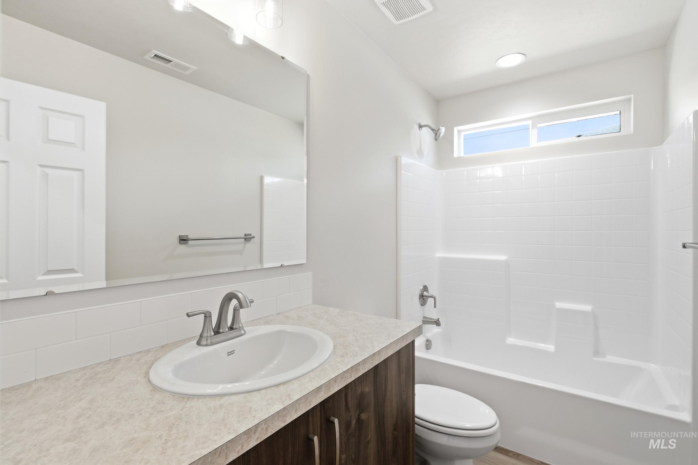 13734 Redway Court Caldwell, ID 83607 - Photo 13 of 20 Full bath featuring vanity and tub / shower combination