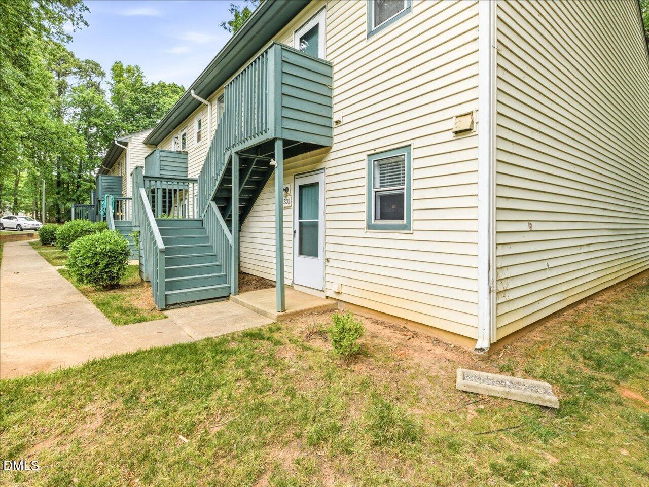 332 Ashley Forest Road Chapel Hill, NC 27514 - Photo 2 of 44 a view of a house with backyard and a tree