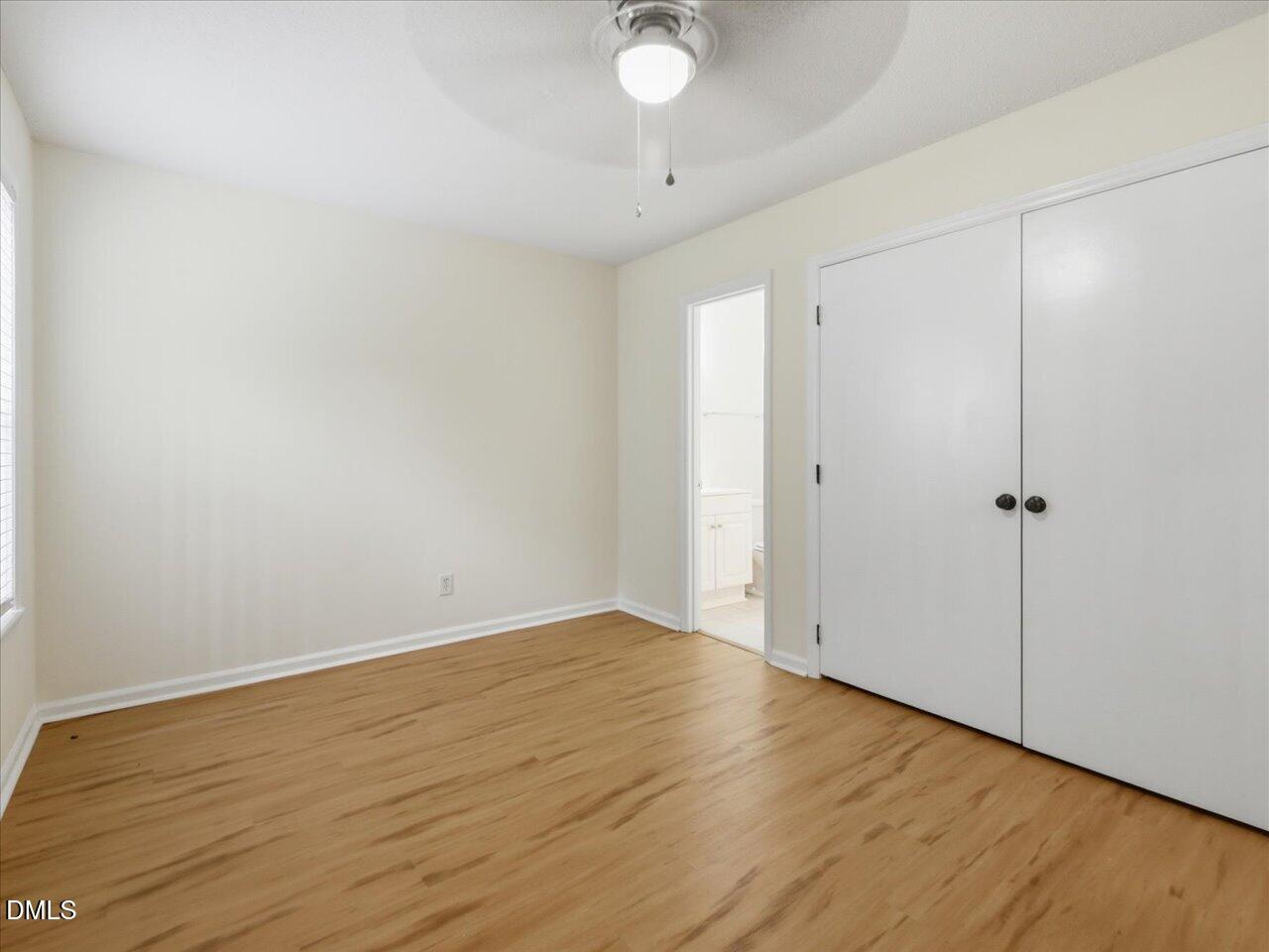 332 Ashley Forest Road Chapel Hill, NC 27514 - Photo 31 of 44 a view of an empty room with wooden floor