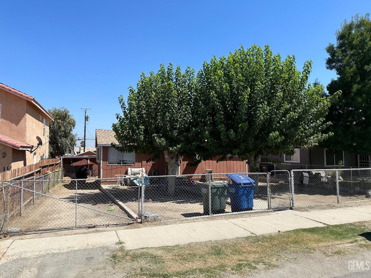 Undisclosed Address Taft, CA 93268 - Photo 2 of 22 a view of a backyard with couches chairs with wooden floor