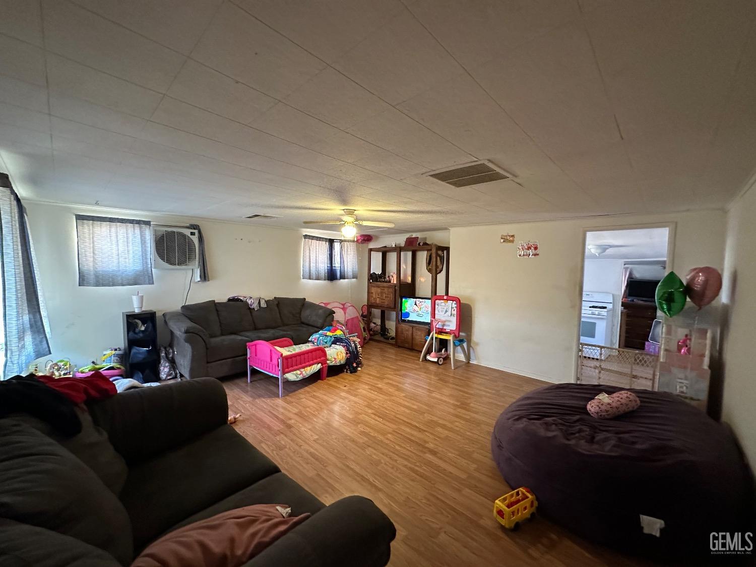 Undisclosed Address Taft, CA 93268 - Photo 4 of 22 a living room with furniture and a couch