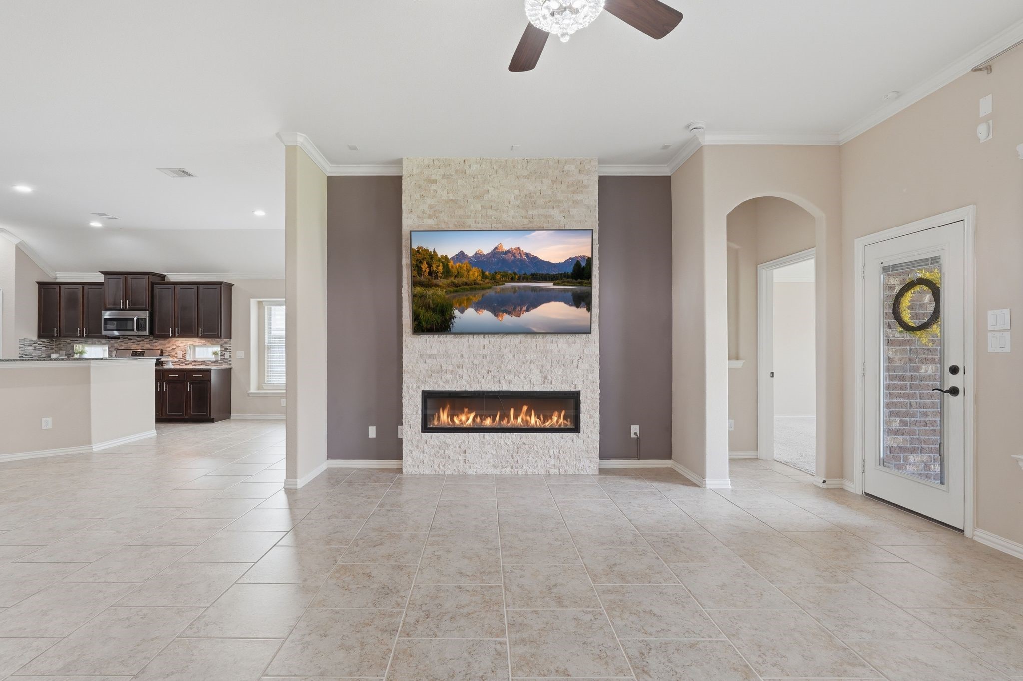 18227 Tacoma Ridge Drive Tomball, TX 77377 - Photo 17 of 45 Open-concept living area with soaring ceilings and seamless access to the main living spaces.