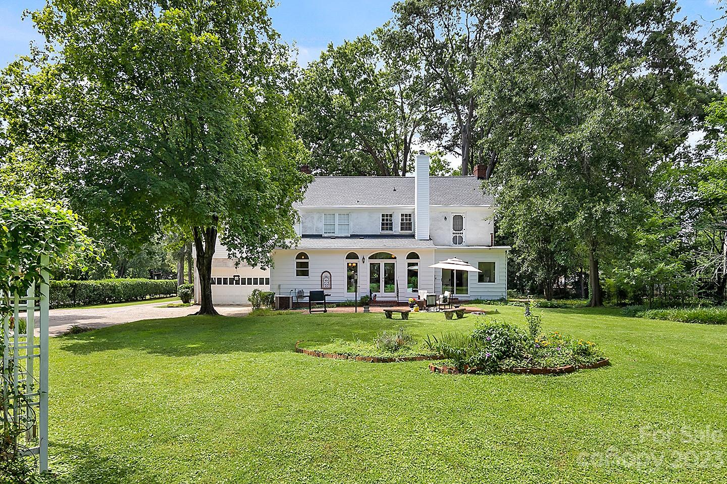 1601 South Wendover Road Charlotte, NC 28211 - Photo 39 of 43 a house that is sitting in the grass