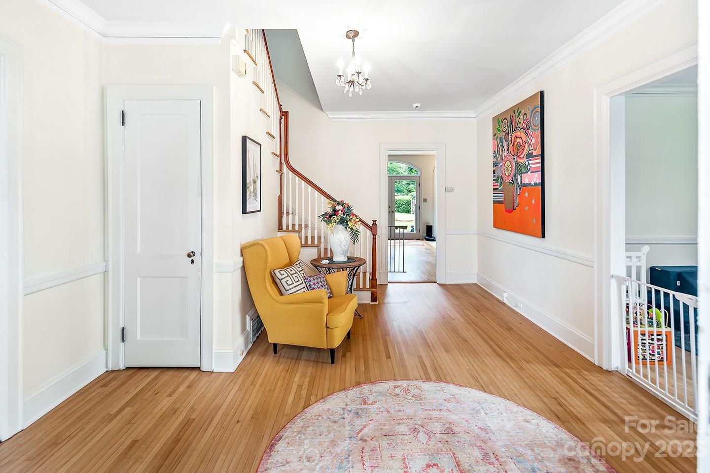 1601 South Wendover Road Charlotte, NC 28211 - Photo 6 of 43 a view of a hallway with wooden floor and furniture