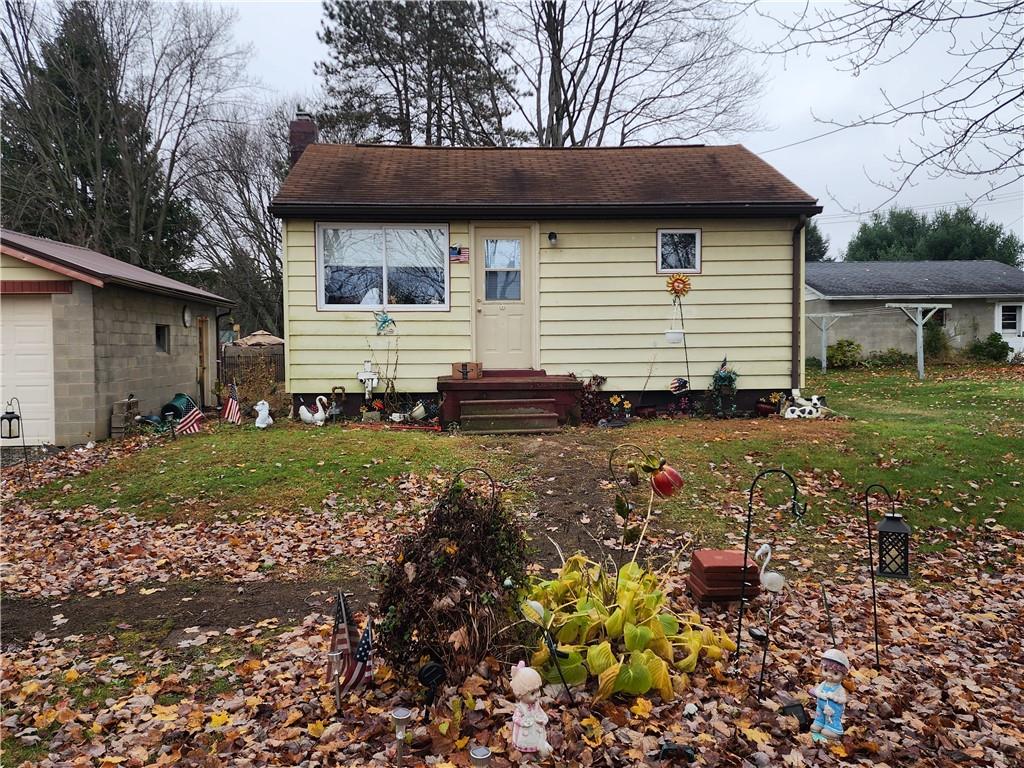 323 Butler Avenue Ellwood City, PA 16117 - Photo 1 of 4 a backyard of a house with lots of green space