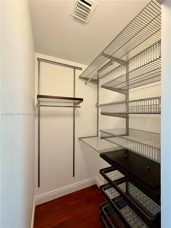 a view of a room with racks on the wall