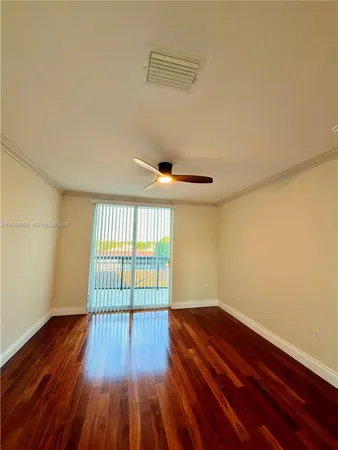 a view of a livingroom with wooden floor
