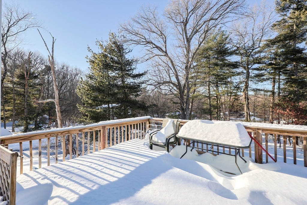 67 Blackstone Street, Unit 67 Bellingham, MA 02019 - Photo 24 of 25 a view of a patio with a yard