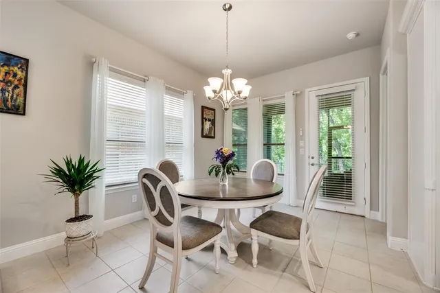 a bedroom with bed and a window