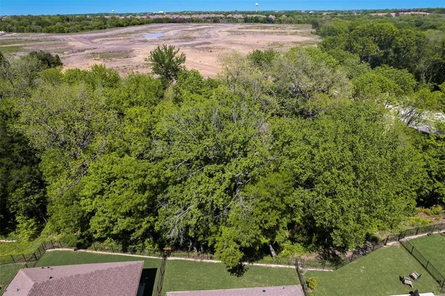 a view of a yard with an outdoor space and seating area
