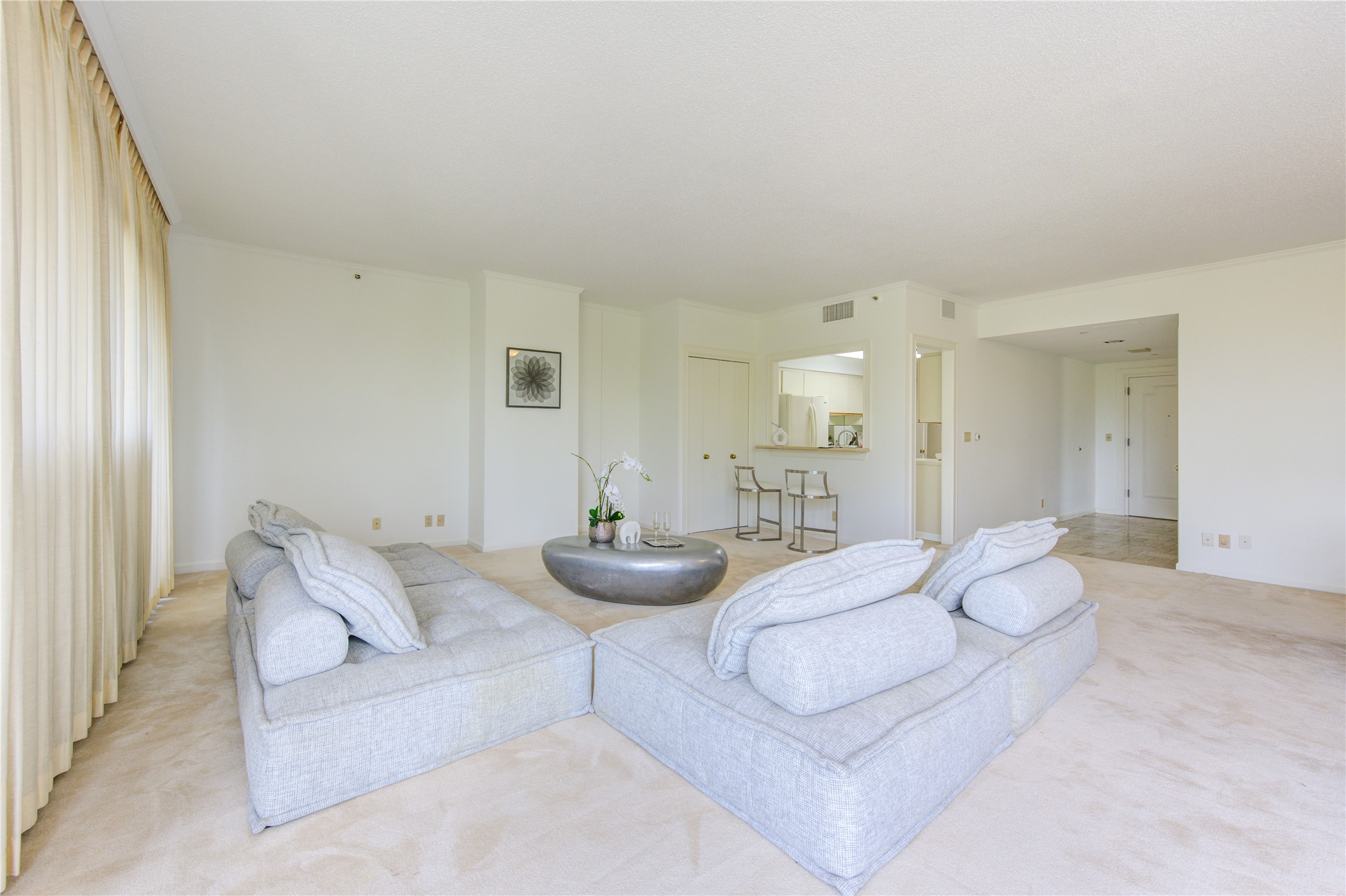 150 Gessner Road, Unit 5A Houston, TX 77024 - Photo 11 of 36 a living room with furniture and a large window
