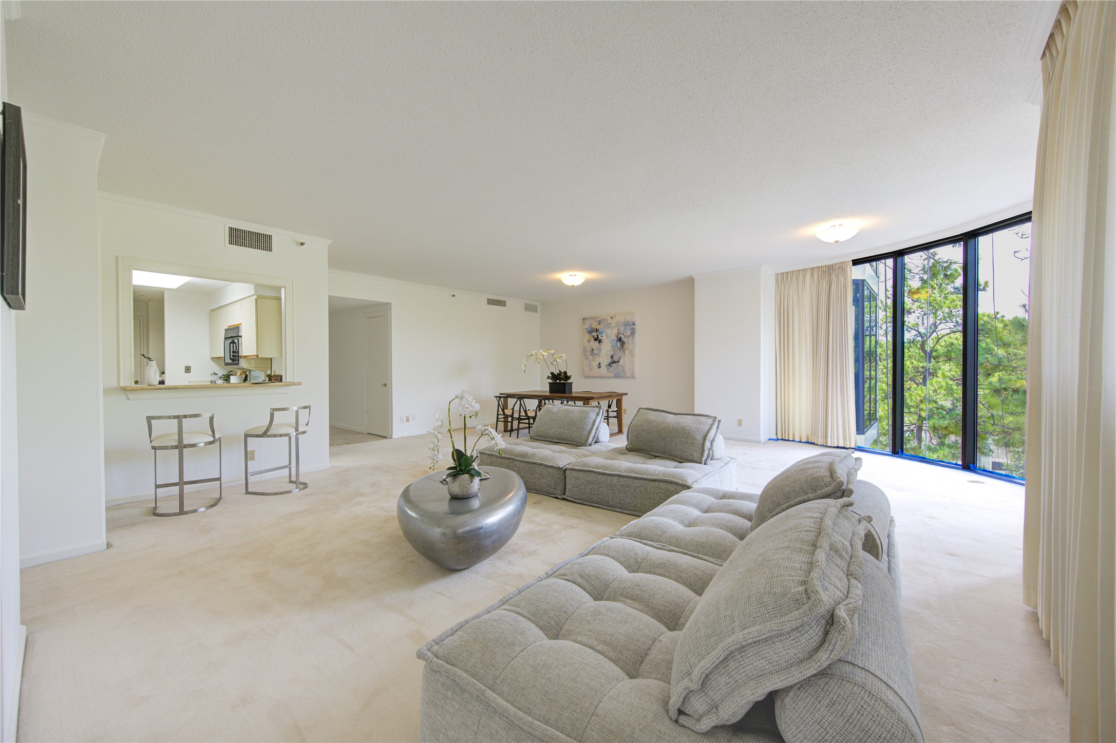 150 Gessner Road, Unit 5A Houston, TX 77024 - Photo 12 of 36 a living room with furniture and a large window