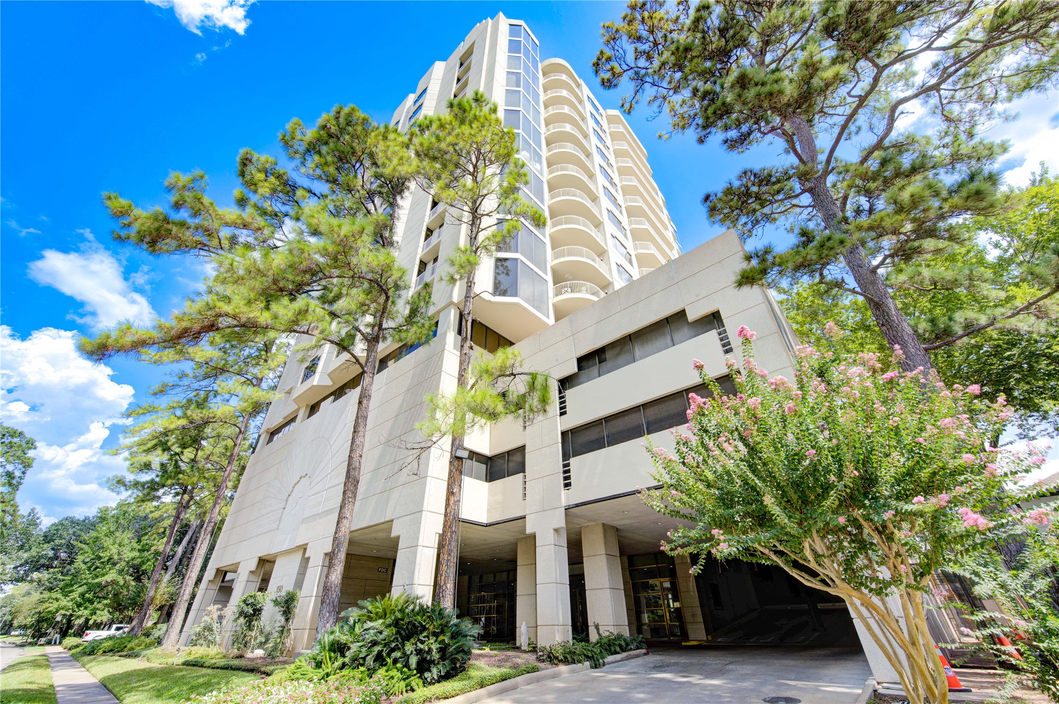 150 Gessner Road, Unit 5A Houston, TX 77024 - Photo 2 of 36 a front view of a multi story residential apartment buildings