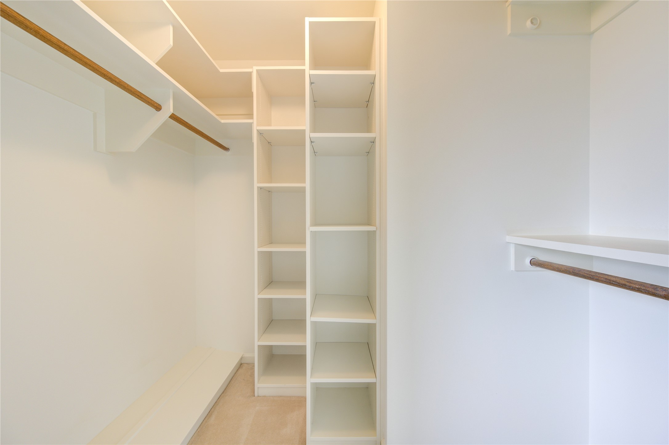 150 Gessner Road, Unit 5A Houston, TX 77024 - Photo 21 of 36 a view of an empty walk in closet